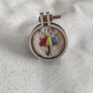 Umbrella hoop pin badge