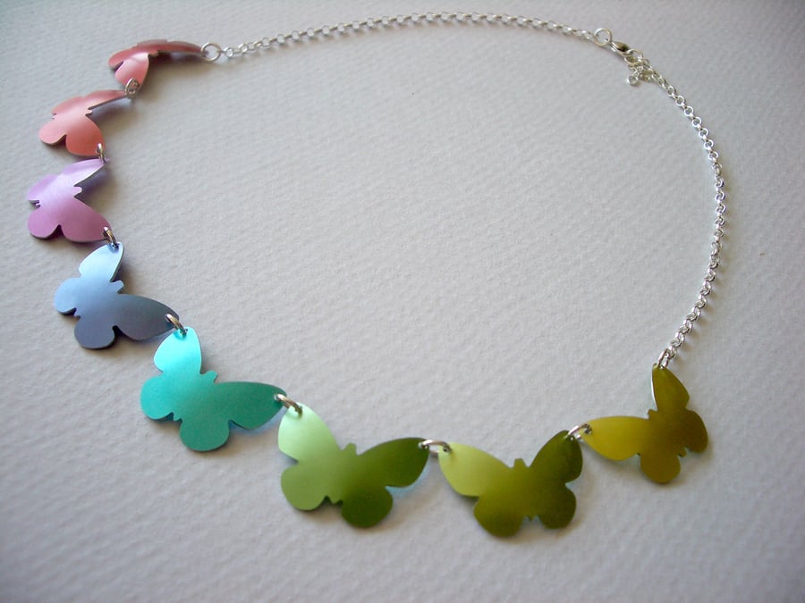 Rainbow coloured butterfly necklace with sterling silver chain