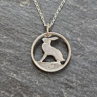 Upcycled hare pendant pierced from an Irish threepence coin