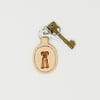 Leather key fob with hand-painted border terrier motif