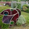 Stained glass ruby red ladybird suncatcher hanging decoration. 