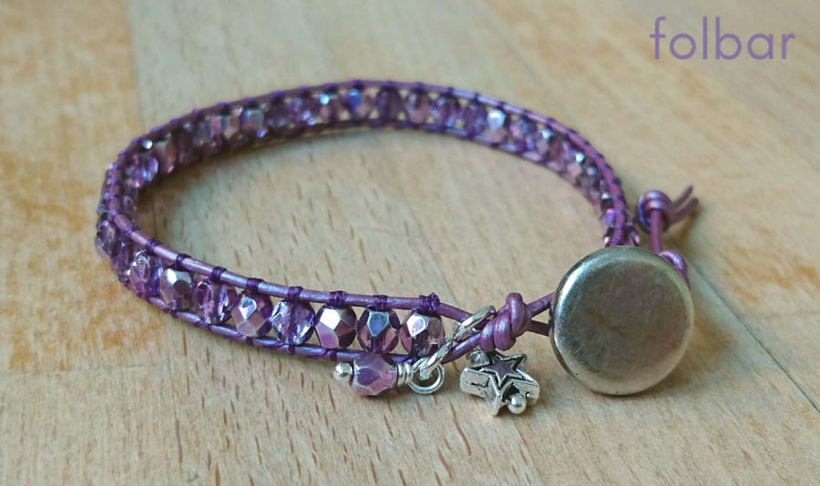 Purple metallic leather and glass bead bracelet with silver button