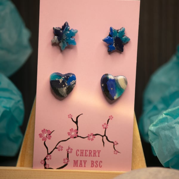 Blue marbled stud earrings, hearts and snowflakes.