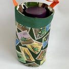 Water bottle carrier with pocket for phone. Green tractor and camo fabric