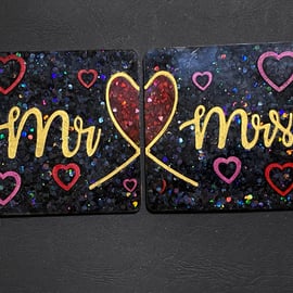 Set of Mr and Mrs Coasters in red, gold and black.