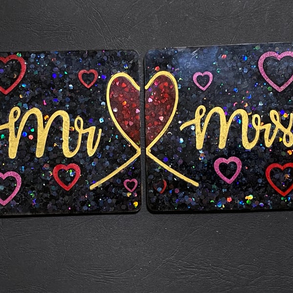 Set of Mr and Mrs Coasters in red, gold and black.