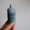Tracks Bottle Slip Decorated onto Stoneware Ceramic