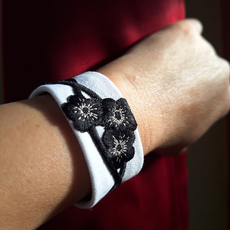 Stylish, Reclaimed Denim Cuff Bracelet - Black & Silver Thread Floral Appliqué 