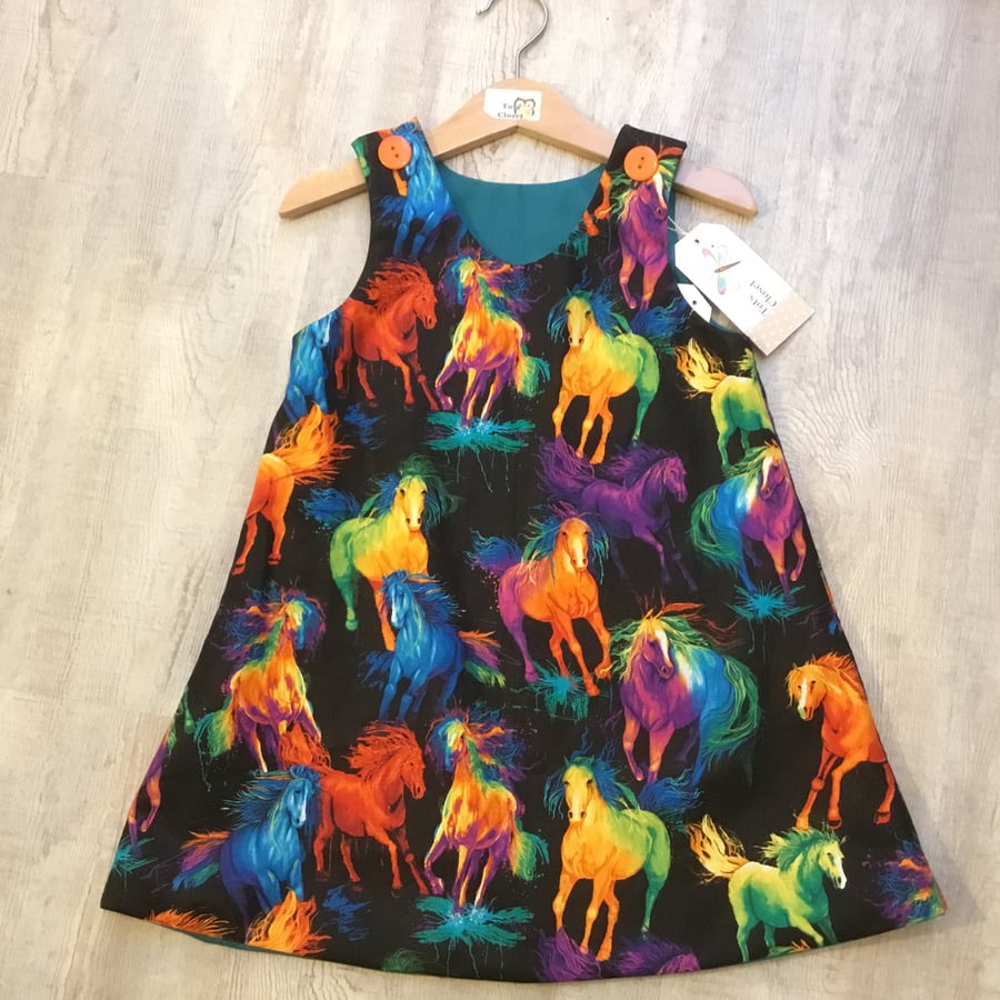 Girls Fun Rainbow Horses pinafore dress, bright coloured horses, party dress