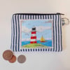 Coin purse lighthouse and sail boat coastal scene make up