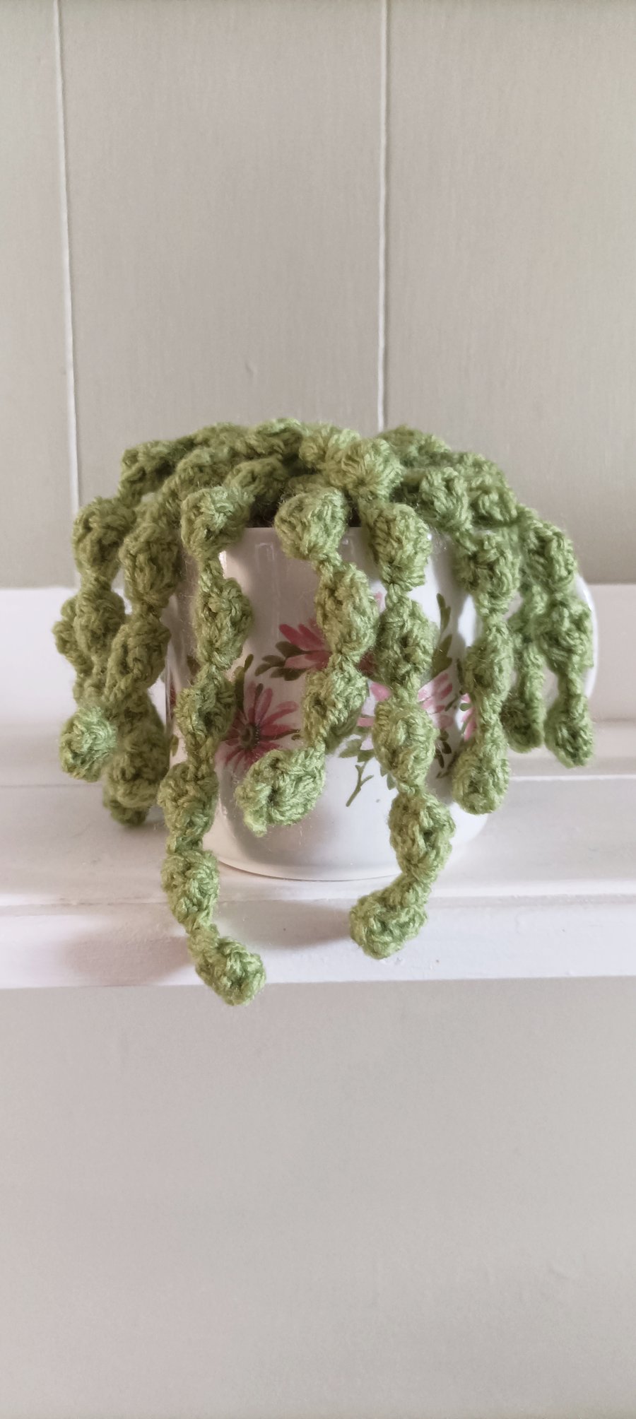 Hand crochet succulent plant in jug