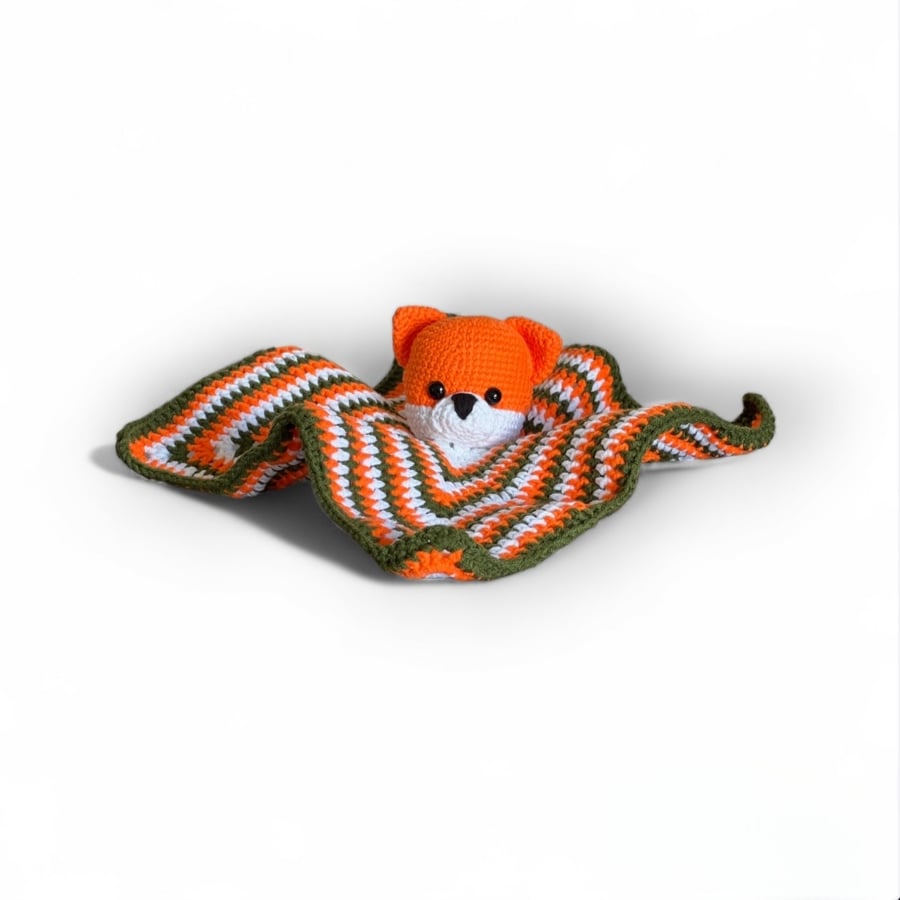 Crochet scops owl toy in the shape of a fox