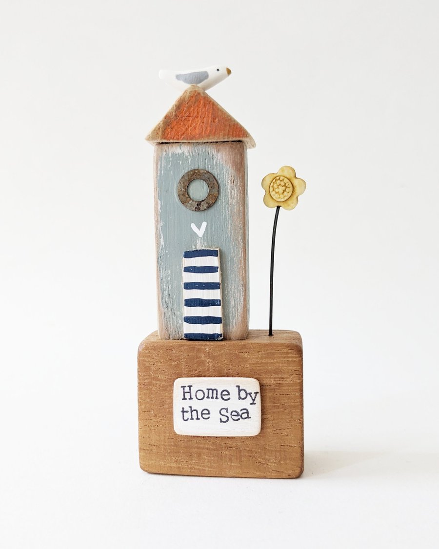 Tall Wooden Sea Hut with Clay Flower and Seagull 'Home by the Sea'