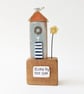 Tall Wooden Sea Hut with Clay Flower and Seagull 'Home by the Sea'
