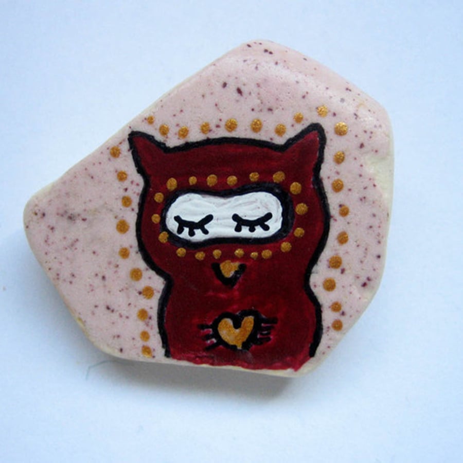Pink owl stone (beach pottery)