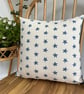 Cushion cover in taupe with navy starfish print, 36cm x 36cm. 