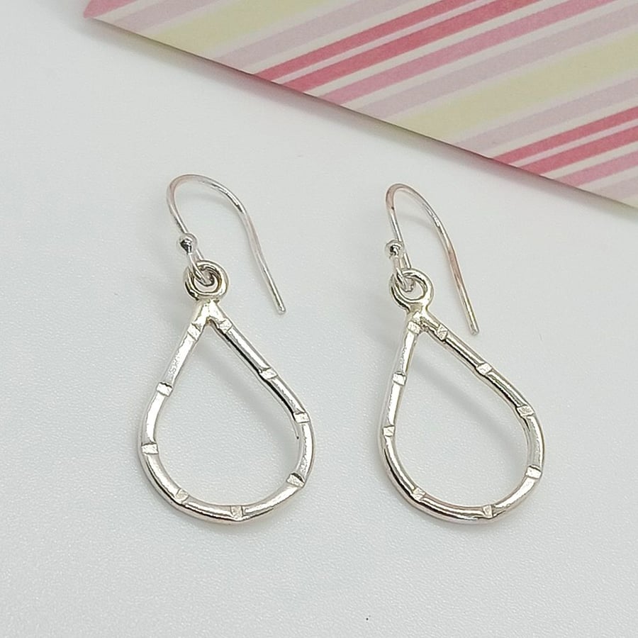 Raindrop earrings with dashed texture sterling silver dangles