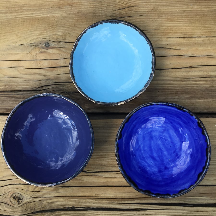 3 small blue ceramic bowls in pretty pastel blue colours