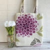 Floral tote bag in cream with a large purple flower