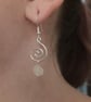 Sterling silver spiral wire dangle earrings with raw clear quartz crystal chunks