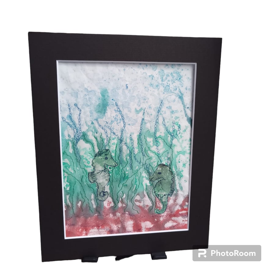 Seahorses and seaweed mixed media collage