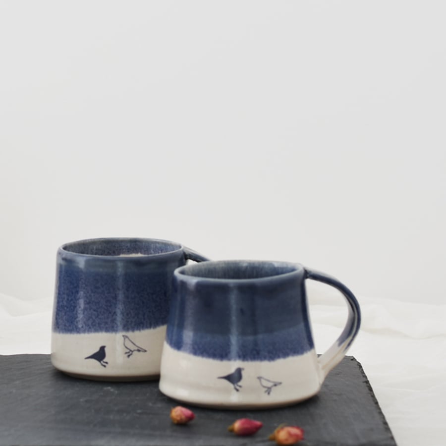 Blue and white ceramic mug with birds - handmade illustrated pottery