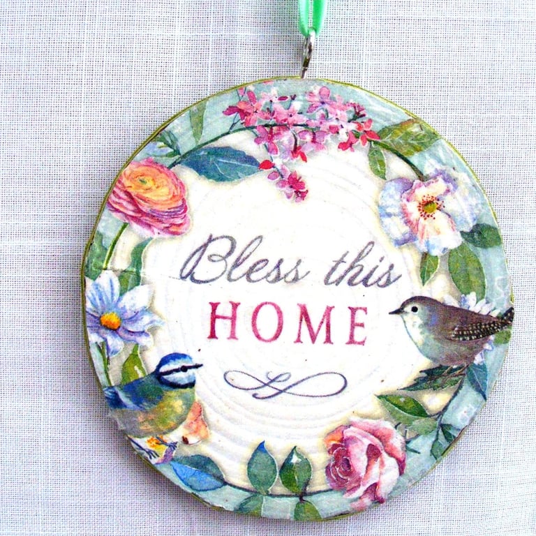 Bless this home decoupaged log slice wall decoration.