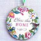 Bless this home decoupaged log slice wall decoration.