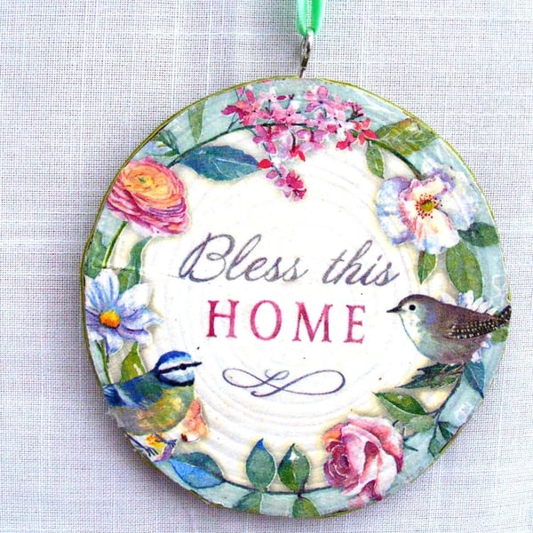 Bless this home decoupaged log slice wall decoration.