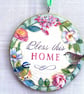 Bless this home decoupaged log slice wall decoration.