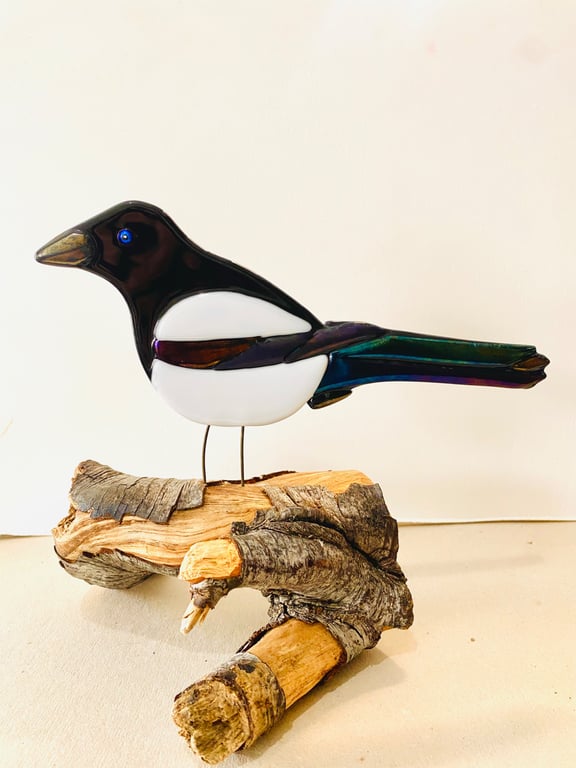 Fused glass magpie ornament on a Natural log stand 