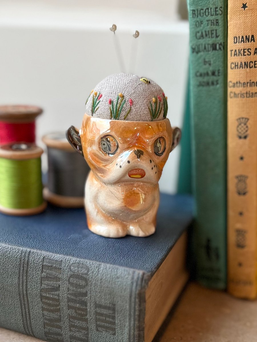 Pin cushion in a vintage dog egg cup embroidered flowers and bee