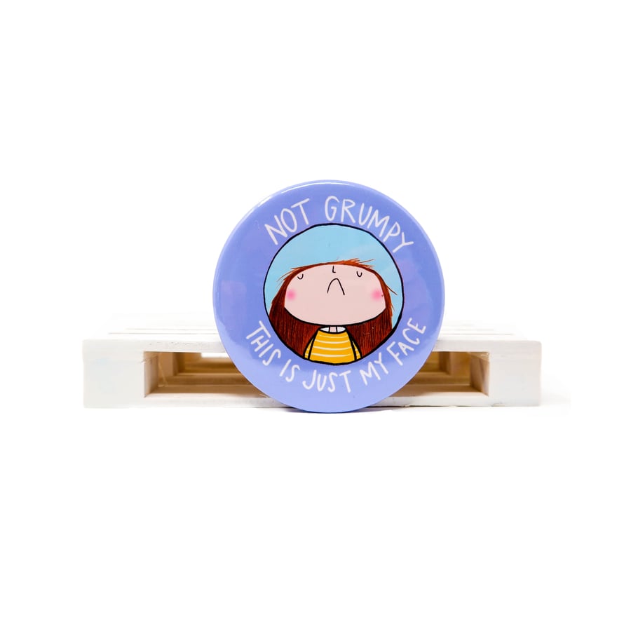 Not grumpy this is just my face badge.