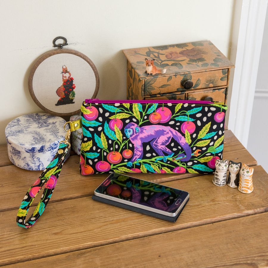 Wristlet purse or small clutch made with Tula Pink print, 'Monkey Wrench'