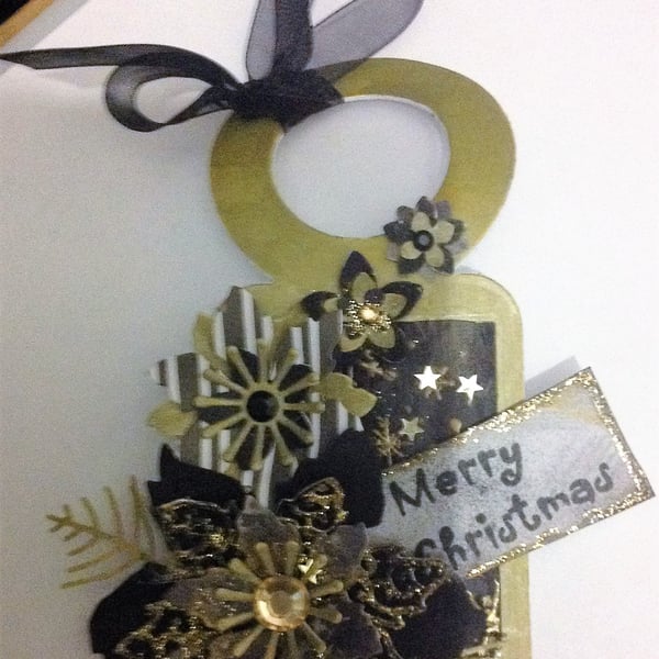Black, gold and white poinsettia Christmas bottle tag