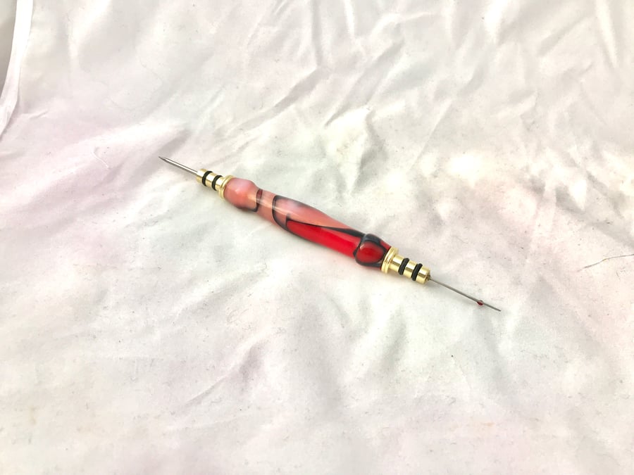 Hand turned seam ripper with stiletto