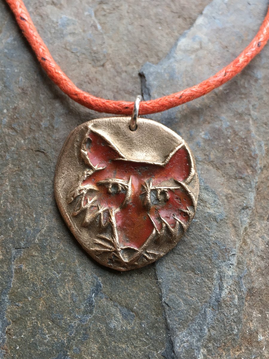 Fox pendant, handmade in bronze, orange cotton cord