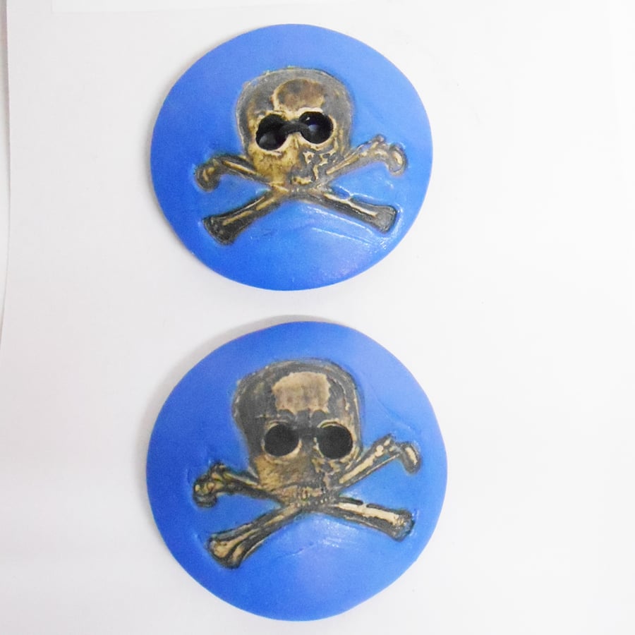 Buttons Satin Bright Blue Skull Symbol Design on white Ceramic clay..