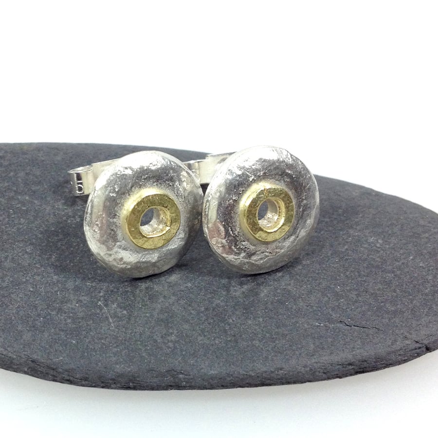 Silver and 18ct gold stud earrings , circular studs