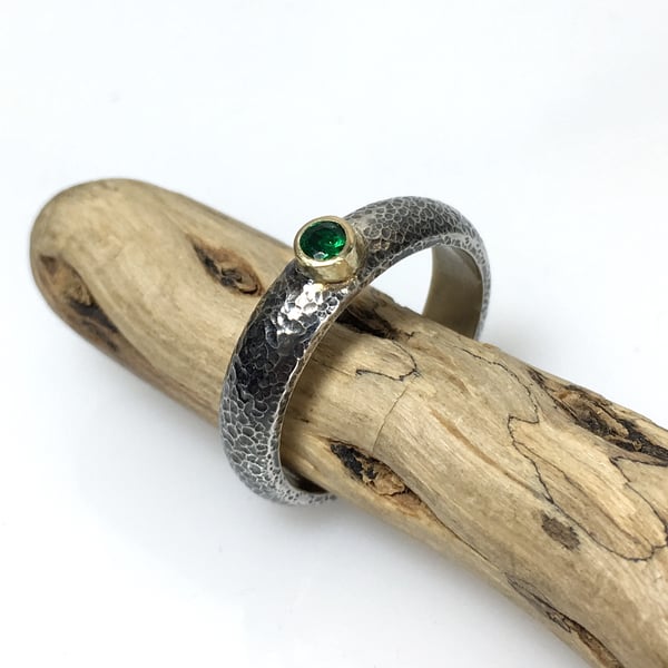 Silver gold and emerald ring