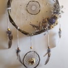 Dreamcatcher with dried flowers
