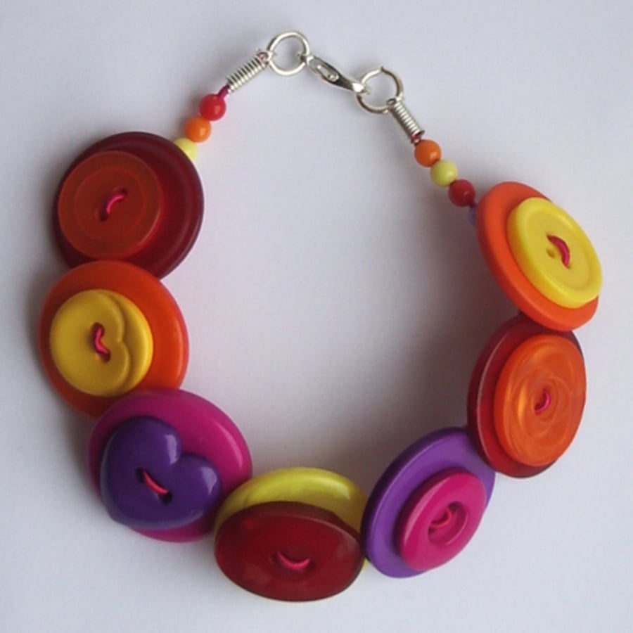 Purple, Yellow, Orange, Red and Fuchsia button bracelet