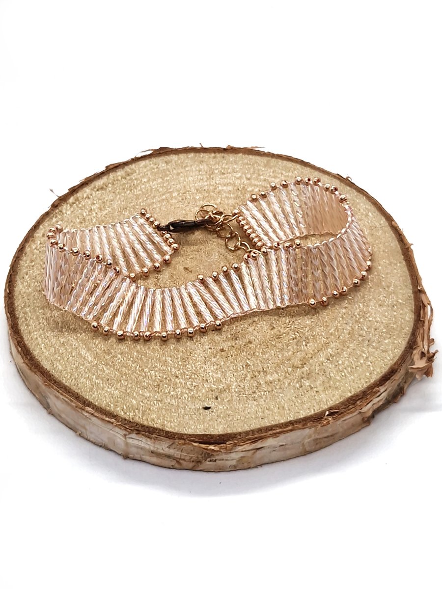 Peach and rose gold twisted bugle bead wavy bracelet