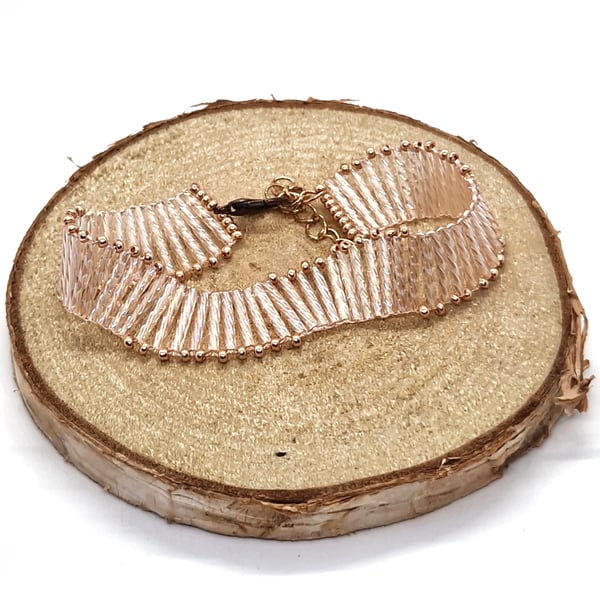 Peach and rose gold twisted bugle bead wavy bracelet