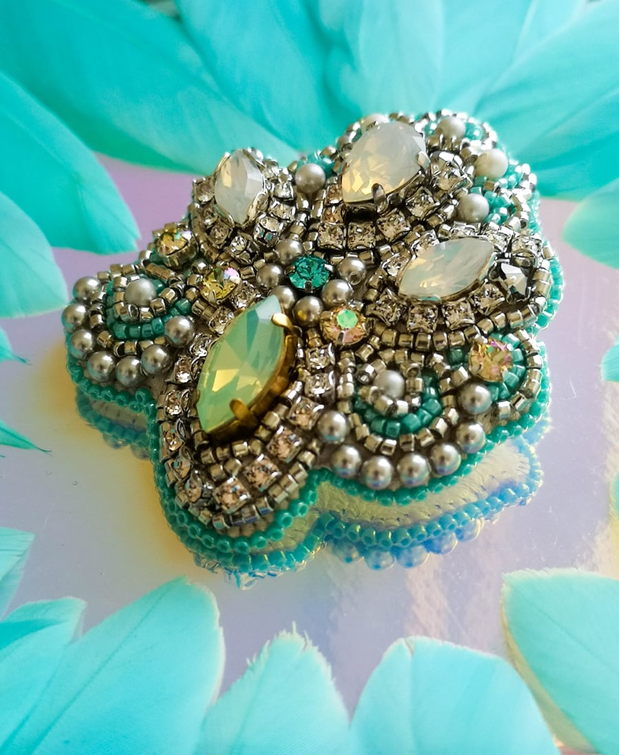 Arabella Swarovski crystal embellished beaded light blue and silver brooch