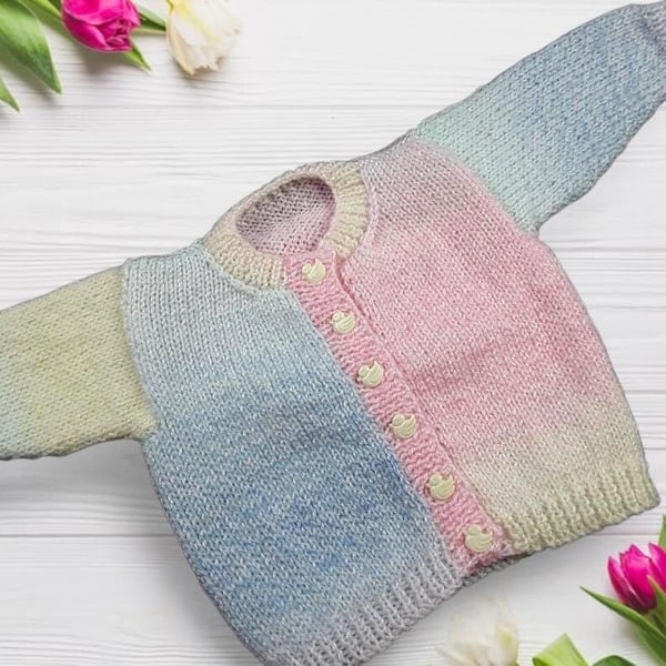 Hand knitted baby cardigan in pastels to fit 0 - 3 months 