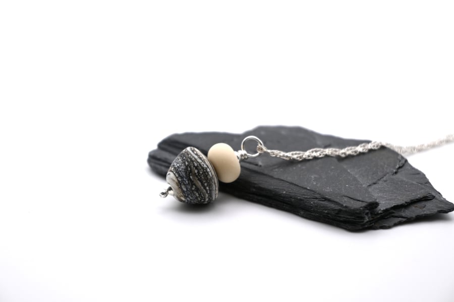 black mottled lampwork glass cone pendant necklace