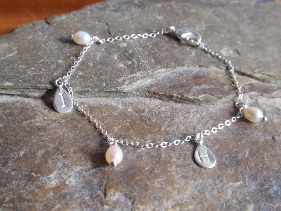personalised bracelet with initials and freshwater pearls, sterling silver