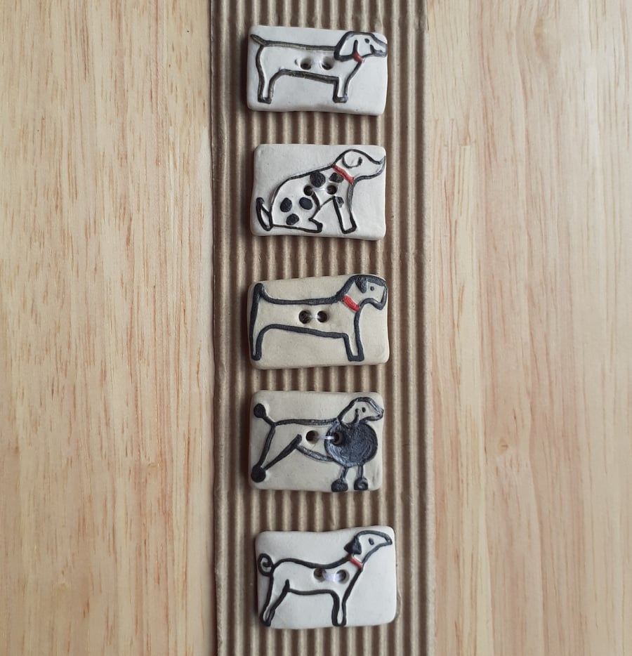 Set of 5 cream assorted dog buttons