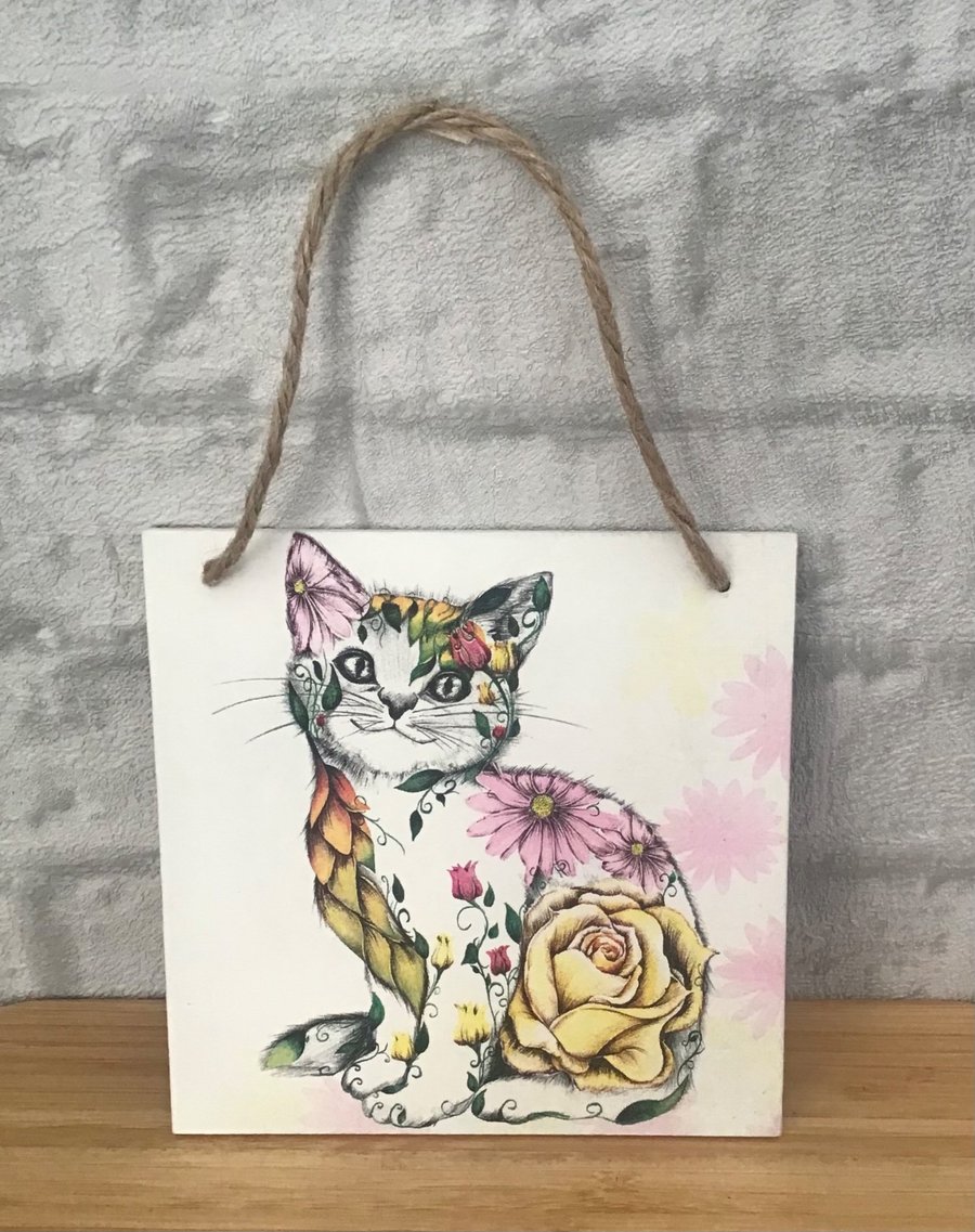 Image of "Rosie" the cat.  Vintage floral wooden wall plaque picture.